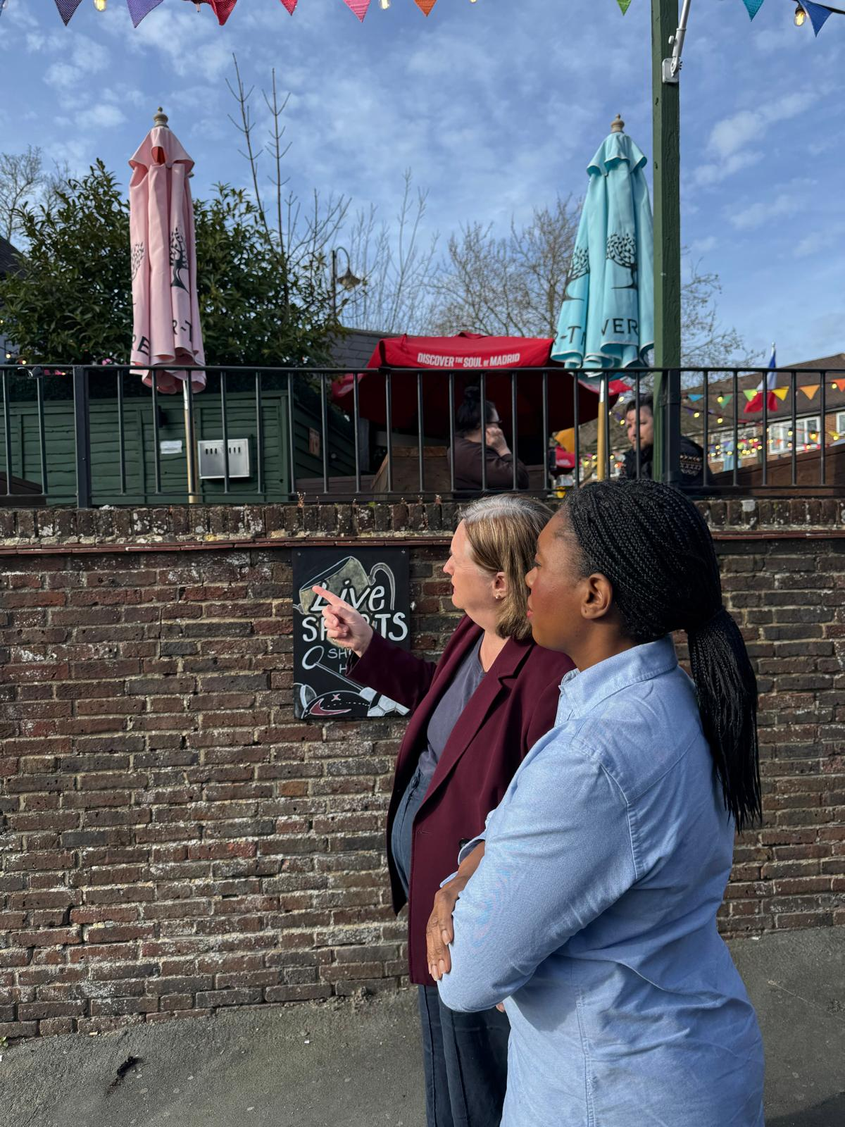 Liz Williams campaigning with residents for priority one